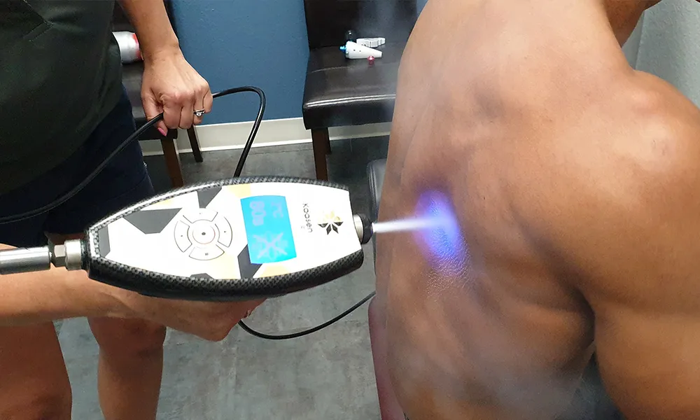 KaasenPro device treating athletes back